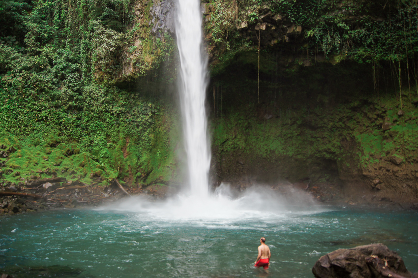 Man at bottom of La Fortuna Waterfall