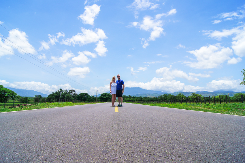 Couple standing in the middle of the road in Costa Rica