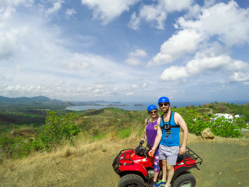 Couple on ATVs at lookout in Costa Rica