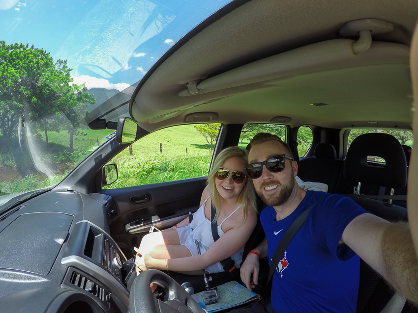 Couple in their 4x4 car driving in Costa Rica