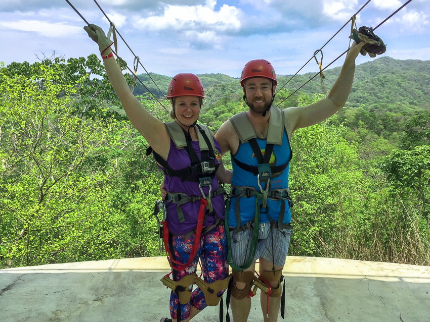 Couple posing before going on the superman zipline in Costa Rica