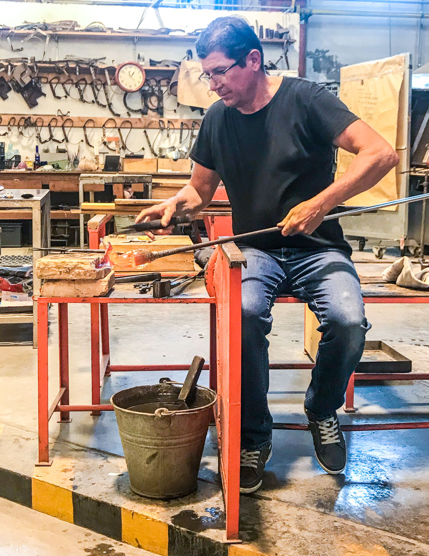 Man blowing glass on Murano Glass Factory tour