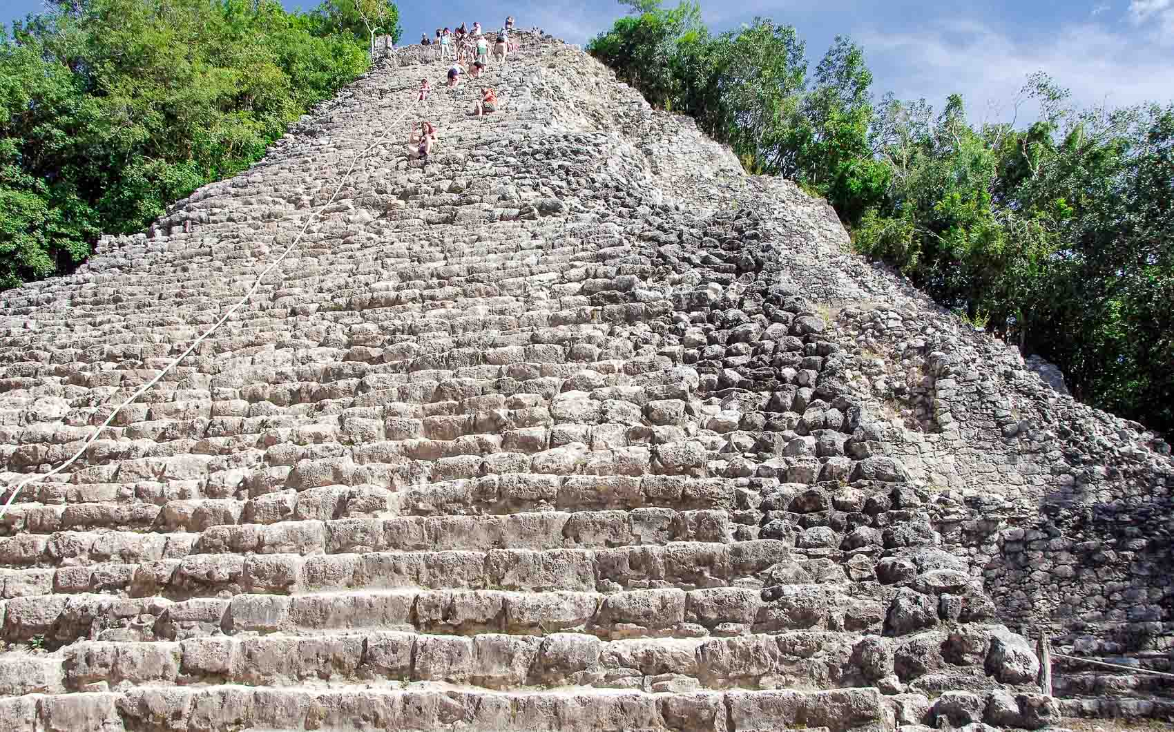 Climbing the Coba ruins in Mexico