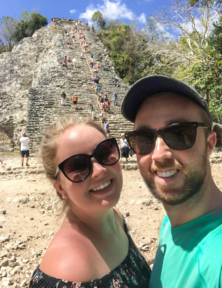 Madison and Liam in front of the pyramid at Coba